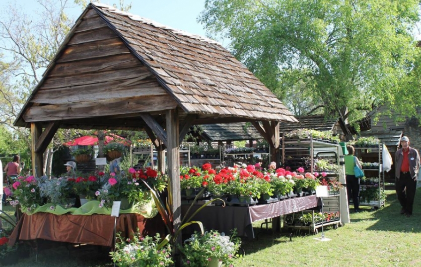 open barn filled with herbs, plants and flowers